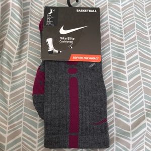 Grey and purple Nike elite dri-fit socks.